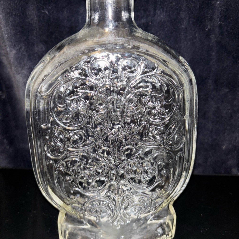 Ornate Clear Glass Bottle